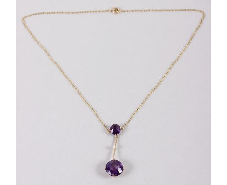 A late 19th century yellow metal amethyst and seed pearl necklace, stamped 15ct 