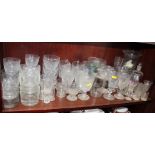 A quantity of custard cups, whisky tumblers, a celery vase, pedestal drinking glasses and other