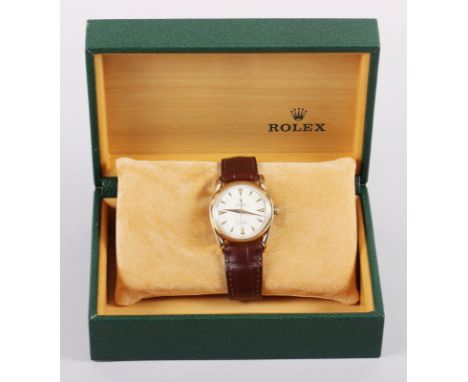 A gentleman's 18ct gold cased Rolex Oyster Perpetual automatic wristwatch with white enamel dial and baton numerals, case dia