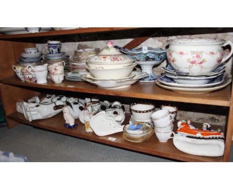 Three pairs of Staffordshire dogs, a Taunton wash jug, bowl and basin, platters teacups, saucers and other items 