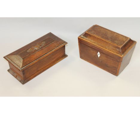 A mahogany and banded sarcophagus tea caddy, 7 3/4" wide, and an oak stationery box with eagle mount, 9" wide 