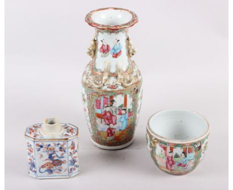 A Canton enamel two-handled baluster vase with gilt decoration, 9 1/2" high, a similar pot (lacking cover) and an Imari tea c