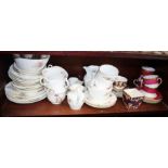 A Coalport part teaset, decorated floral sprays, a Wedgwood Imari design vase, 3" high, a similar
