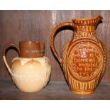 A Doulton Lambeth commemorative relief decorated jug and an ale jug