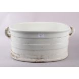 A 19th century white glazed two-handled basin