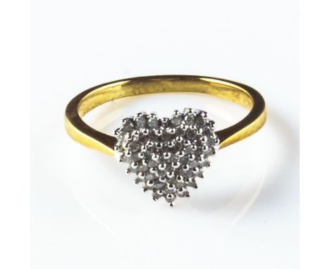 A lady's 9ct gold 3gm, 25pt 1/4 ct diamond cluster ring