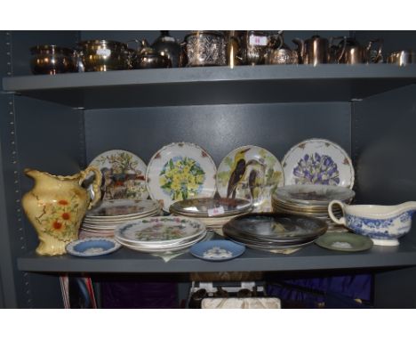 A selection of various ceramic and porcelain display plates and Wedgwood