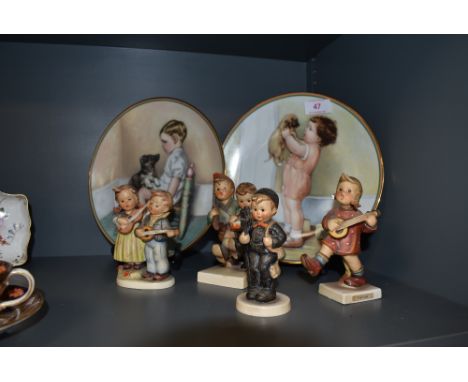 Two figure studies by Hummel and two ceramic display plates.
Drummer duo in good condition
Guitarist Duo in good condition
Tw