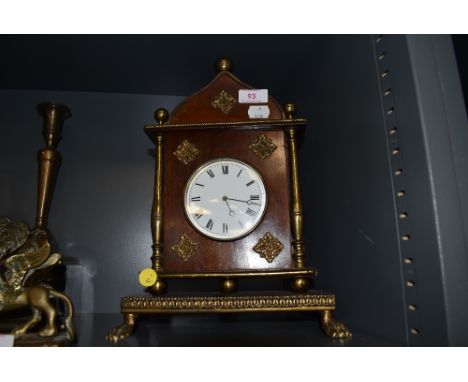 A mantle or bracket clock having mahogany case with ormolu decoration and enamel face,untested