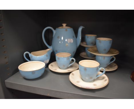 A part tea service in a blue ground with star design by Alfred Meakin in the Morning star design