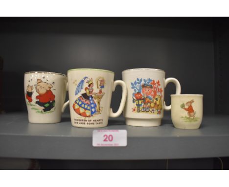 Four childrens ceramic cups one being decorated with Magic Roundabout characters