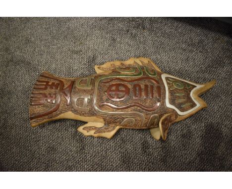 A large ceramic studio pottery figure of a fish having Celtic style decoration marked Troika Cornwall BW to base 60cm long ap