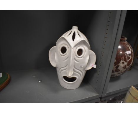 A ceramic lamp base in the form of a grotesque figure head or mask marked Italy to base