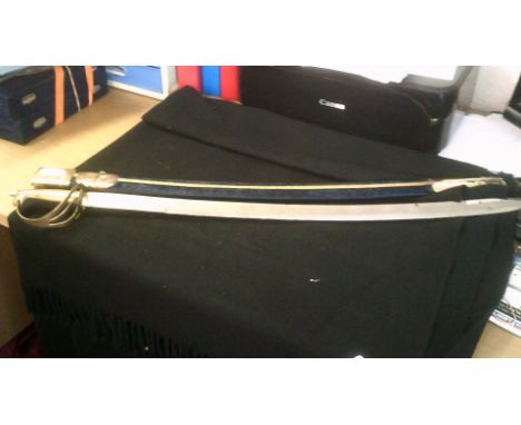 Indian Ceremonial Souvenir Sword with blue velvet scabbard, brass handle with 'Made in India' etched on the blade. 