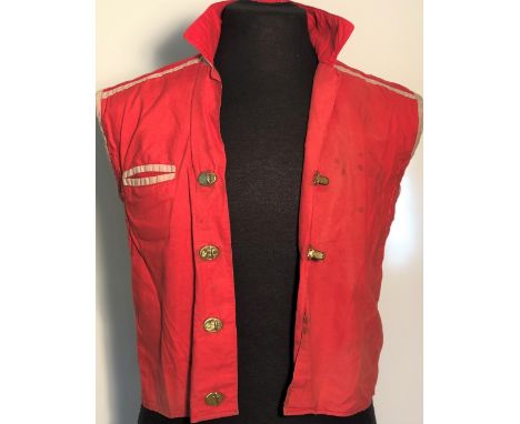 JOE STRUMMER STAGE WORN SLEEVELESS JACKET. An original sleeveless jacket, red with contrast khaki jetted pocket and edges and