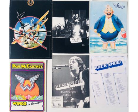WINGS TOUR PROGRAMMES/TICKET. Collection of Wings memorabilia to include: 1973 ticket stub for Hammersmith Odeon, five assort