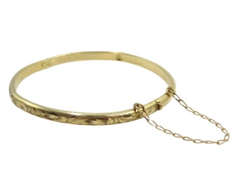 9ct gold bangle, engraved decoration, hallmarked, approx 5.5gm - Condition Report Dents throughout