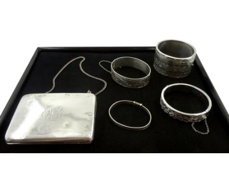 Silver bangle by Henry Griffith &amp; Sons Ltd, Birmingham 1957, three other silver bangles stamped or hallmarked and a silve
