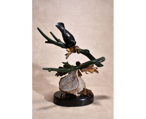λLyle Sopel (Canadian, b. 1952), a green nephrite carving of a bird on oak branches, with tiger's eye leaves and acorns, the 