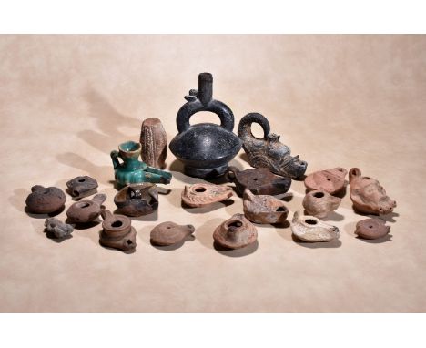 A collection of Roman pottery oil lamps, circa 3rd ~ 5th century A.D., the largest 12cm long; an Islamic turquoise glazed pot
