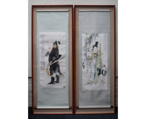 A pair of 20th century Chinese scroll paintings, one depicting a standing man in black holding his sword, the other of a youn