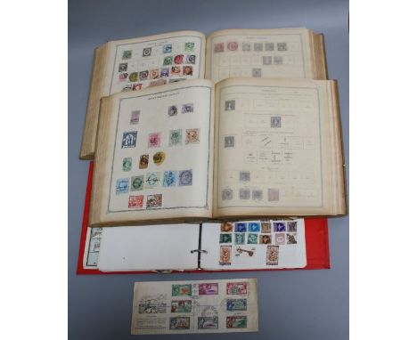 An early 20th century Stanley Gibbons stamp album and collection for The British Empire, and another similar for the rest of 