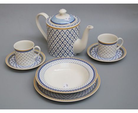 A Villeroy and Boch Perpignan breakfast service comprising teapot, milk, nine cups, eight saucers, twelve 27cm plates, twelve