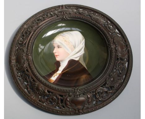 *** RE OFFER JULY £40-60***
A late 19th century Continental porcelain dish, finely painted with a bust length portrait of a y