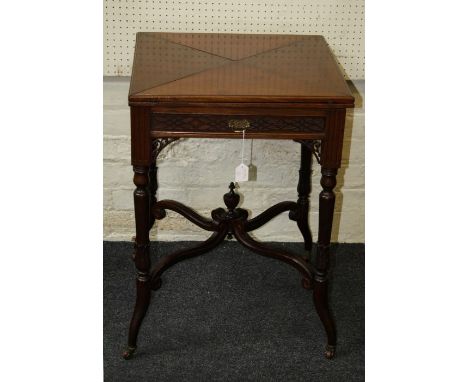 Maple and Co, an Edwardian mahogany 'Chinese Chippendale' envelope card table, the beize lined top with counter provisions ov