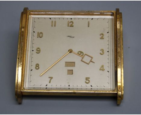 A circa 1970's gilt metal cased Imhof desk clock, the mechanical movement case number 867542