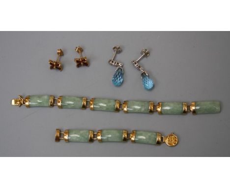 A pair of 14ct white gold and blue topaz briolette earrings, set with diamonds, with a jade and yellow metal bracelet (stampe
