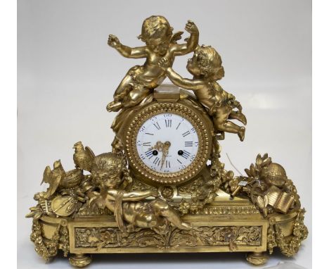 A good French mantel clock, circa 1860, decorated with cherubs, flora and fauna, heavily decorated in relief, movement stampe
