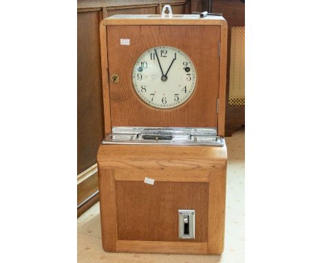 *** RE OFFER JULY £50-80***
A Modern Industrial clocking-on clock in oak case, 14" x 27" x 12". Wall or desk-mounted with chr