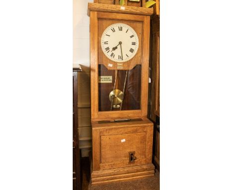 A good wall industrial time recorder, fusee movement serial number 61409, contained in an oak case 17" x 45" x 12" with 9" ro