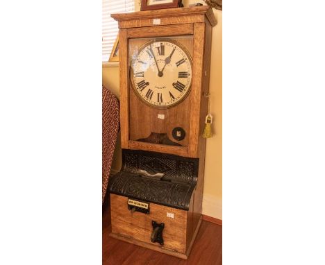 A good Blick Time Recorder industrial time recorder / clocking-in clock in oak case, 13" x 35" x 11" with 9-inch dial&nbsp; F