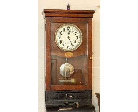*** RE OFFER JULY £60-80***
An Edwardian wall-mounted industrial time recorder/clocking-in clock with fusee movement containe