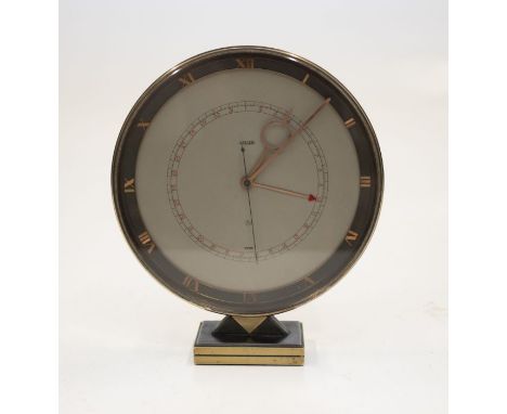 A Jaeger Le Couture Art Deco style mantel clock, or bedside clock, with 6" dial, centre seconds, centre date calendar, on a s