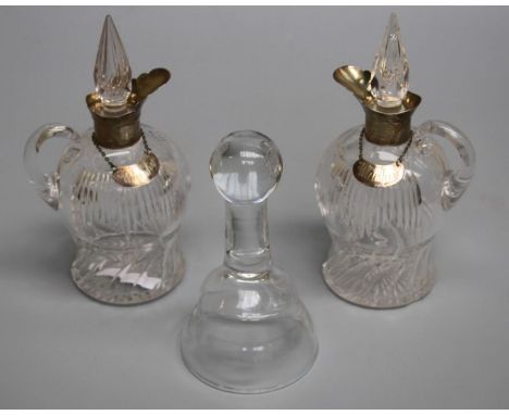 Army and Navy Cooperative Society Ltd, a pair of silver mounted facet and slice cut crystal whisky hoggins, each with conical