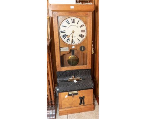 A good National Time Recorders industrial clocking-on clock contained in beech-style case, 14" x 39" x 11" with 9-inch dial. 