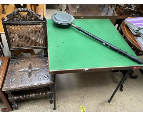 A 19th century carved oak hall chair together with a card table and a copper bed warming pan