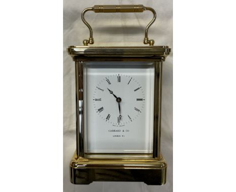 A Garrard &amp; Co brass cased carriage clock, with Roman numerals, striking on a bell