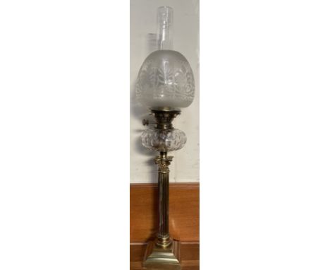 A brass and faceted clear glass oil lamp, with an etched glass shade, the brass burner marked Hinks No.2 Duplex, with a Corin