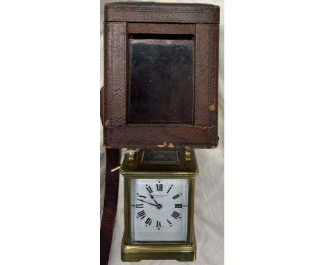 A 19th century brass cased carriage clock, the rectangular dial with Roman numerals inscribed Stewart Dawson &amp; co, striki