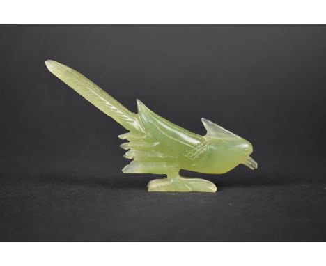 A Small Carved Green Jade Figure of a Bird, 10.5cms Long 