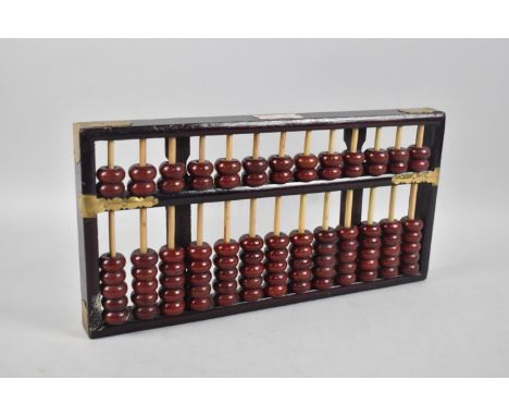 A Modern Chinese "Red Lion" Abacus, 36cms Wide 