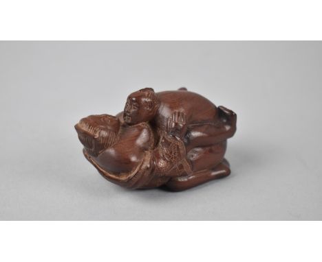 A Modern Carved Wooden Erotic Netsuke in the Form of Couple "In Flagrante", Signed to Base 