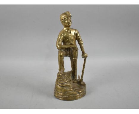 A Cast Brass Figure of a Miner with Axe and Safety Lamp, 28cms High 