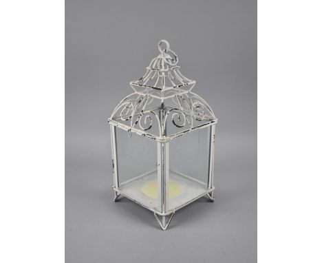 A Modern White Painted Metal Lantern, 32cms High 
