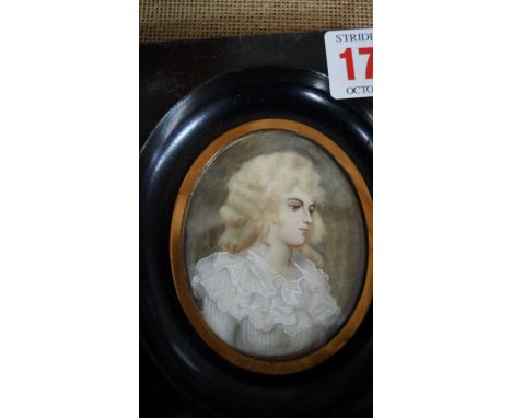 An antique portrait miniature of a lady, 7 x 5.5cm oval.