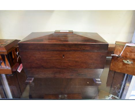 A 19th century rosewood sarcophagus tea caddy, 30cm wide. 